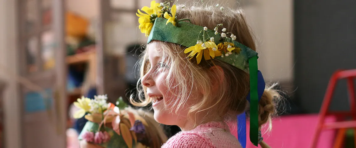 Kindergarten child at Cardiff Steiner School wearing flower crown